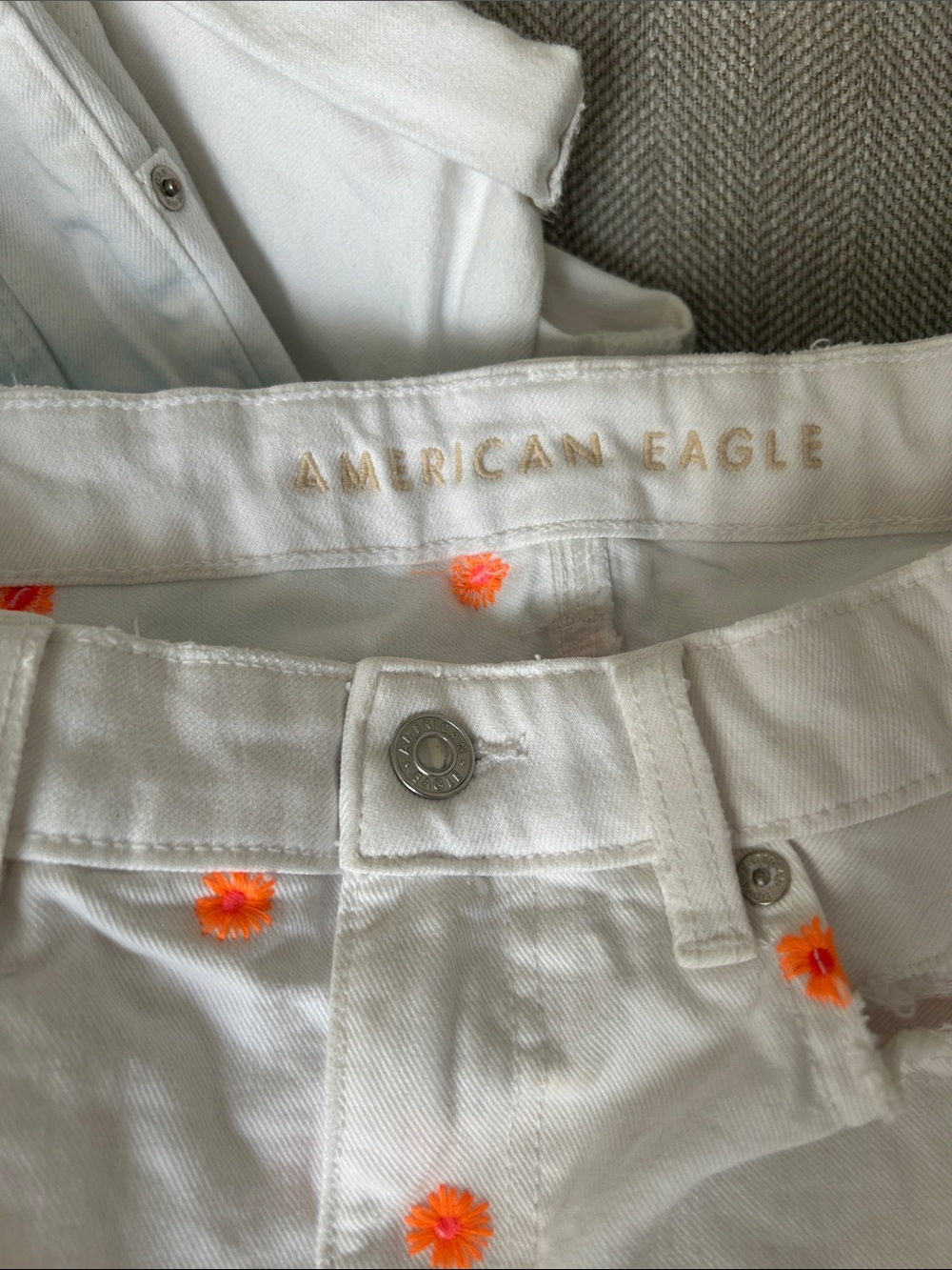American Eagle Outfitters White Jean Shorts with Orange Floral Accents
